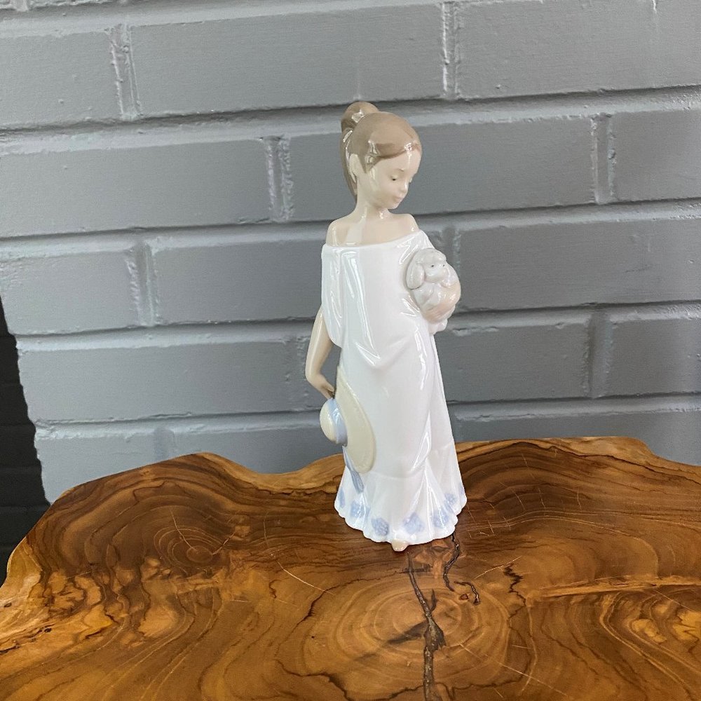 NAO by Lladro Porcelain Figurine, Young Girl Holding a Lamb, 8-1/4" tall